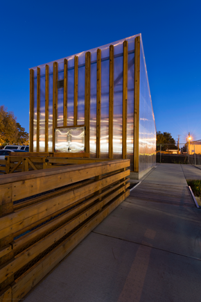 Denver apartment for rent - the exterior of a building at night with the windows lit up