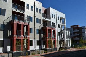 Denver apartment for rent - a row of new apartment buildings on a city street