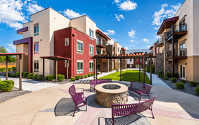 Denver apartment for rent - A courtyard with a fire pit and chairs.