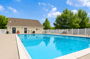Ashland townhouse for rent - A small pool in a backyard with a white fence.