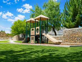 El Paso townhouse for rent - A playground with a slide and a swing set.