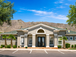 El Paso townhouse for rent - The image shows a building with a green roof and a sign that reads "BAG".