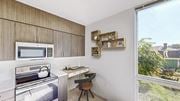 Boston apartment for rent - a kitchen with a stove and a microwave
