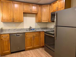 Stoughton apartment for rent - Essex Stoughton kitchen with granite countertops stainless appliances dishwasher range oven microwave