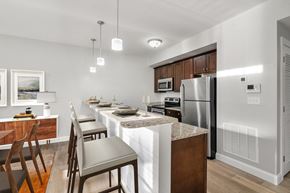 Ashland apartment for rent - Ashland woods apartment kitchen with stainless steel appliances, stove, microwave, oven, and granite counters