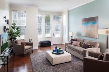 Weymouth apartment for rent - a living room with a couch and chairs and a table