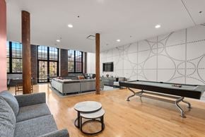 Lawrence apartment for rent - A room with a pool table and a couch.