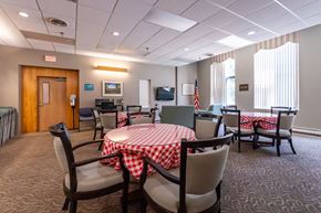 Hingham apartment for rent - the community room with a table and chairs