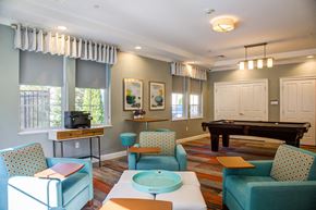 Lynnfield apartment for rent - A living room with a pool table and a television.