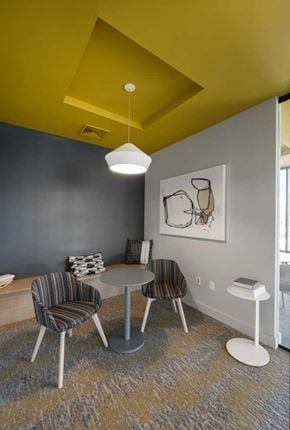 Billerica apartment for rent - a dining room with a yellow ceiling and gray walls