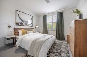 Billerica apartment for rent - a bedroom with a bed and a dresser