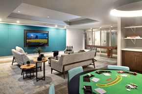 Boston apartment for rent - a room filled with furniture and a flat screen tv