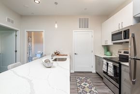 Canton apartment for rent - Millside kitchen granite countertops stainless appliances oven range microwave bright finishes