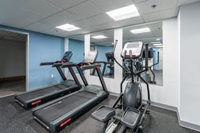 Quincy apartment for rent - a gym with treadmills and elliptical machines