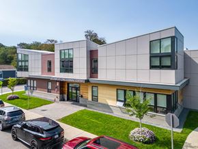 Framingham apartment for rent - Pelahm lifelong learning center from drone with cars