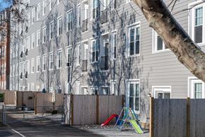 Whitman apartment for rent - an empty playground in front of an apartment building