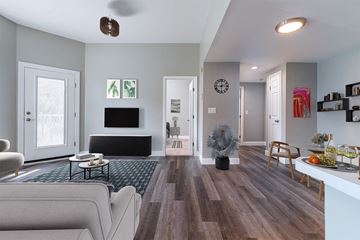Whitman apartment for rent - a living room with a couch and a tv