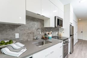 Somerville apartment for rent - Union 346 Kitchen with bright white cabinets at Union 346, Somerville Massachusetts