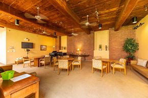 Andover apartment for rent - a large room with tables and chairs and a couch