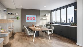 Chelsea apartment for rent - A modern kitchen with a dining table and chairs.