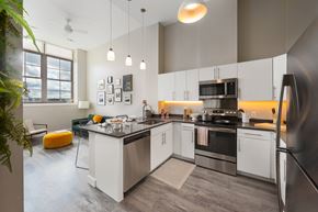 Lawrence apartment for rent - a kitchen with stainless steel appliances and a counter top
