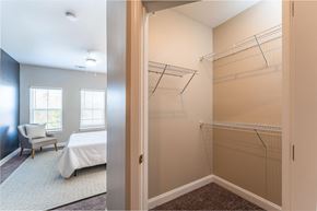 Hanover apartment for rent - A bedroom with a bed and a walk-in closet.
