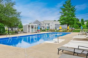 Canton apartment for rent - our apartments have a large swimming pool and lounge chairs at Blue Hills Village, Canton, Massachusetts
