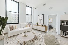 Pittsburgh apartment for rent - a living room with a white couch and a coffee table at Letsche School, Pennsylvania, 15219