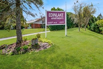 Edinboro apartment for rent - A sign for Edinlake Apartments is displayed in a grassy area.