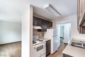 Worcester apartment for rent - an empty kitchen with white appliances and a white refrigerator at Whittier Terrace, Worcester, MA, 01609