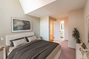 Worcester apartment for rent - a bedroom with a bed and a painting on the wallat Royal Worcester Apartments, Worcester, 01610