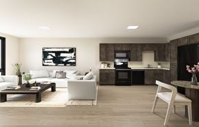 Pittsburgh apartment for rent - A modern living room with a white sofa, a wooden coffee table, and a white chair.