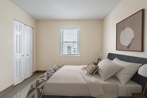 Canton apartment for rent - A bedroom with a bed at Blue Hills Village, Canton, MA.