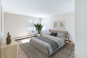 Littleton apartment for rent - A bedroom with a large bed  at Pondside at Littleton Apartments.
