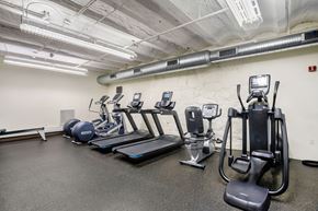 New Haven apartment for rent - A gym with treadmills, elliptical machines, and other exercise equipment at Brewery Square Apartments, New Haven , CT
