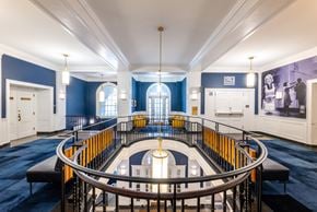 Boston apartment for rent - the interior of a building with a circular staircase and blue walls and white ceilings  at 140 Clarendon, Massachusetts, 02116
