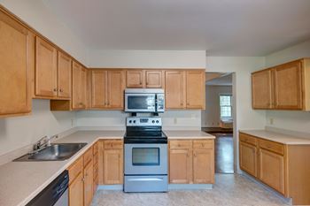 Stainless steal appliances in kitchen.