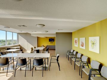 Beverly apartment for rent - a dining room with tables and chairs and yellow walls