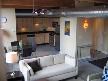 Haverhill apartment for rent - an open living room and kitchen with a white couch