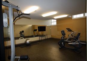 Lawrence apartment for rent - Fitness Center With Workout Equipment at Sacred Heart Apartments, Lawrence, MA 01843 