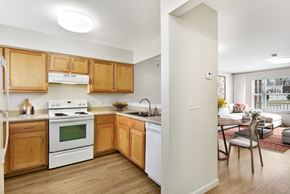 Watertown apartment for rent - Open Kitchen Layout With View Into Living Room Area at Creekwood Apartments, New York