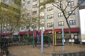 Boston apartment for rent - a playground in front of an apartment building at Tai Tung Village, Boston