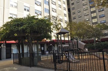 Boston apartment for rent - a childrens playground in the middle of an apartment building