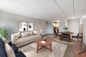 Worcester apartment for rent - A living room with a sofa, chairs, and a coffee table.