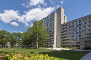 Springfield apartment for rent - an office building with a lawn and trees in front of it