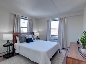 New Haven apartment for rent - a bedroom with a large bed and two windows at Ninth Square Apartments, Connecticut, 06510
