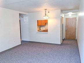Wheeling apartment for rent - Open Living Room Floor Plan with Breakfast Bar to Kitchen. at Montani Towers, Wheeling, WV