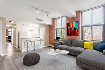 New Haven apartment for rent - a living room with a couch and a table