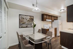 Portage apartment for rent - a kitchen and dining room with a table and chairs
