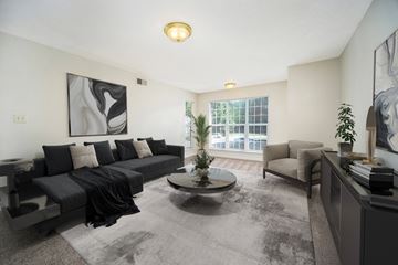 Greensboro apartment for rent - a living room with a couch and a coffee table